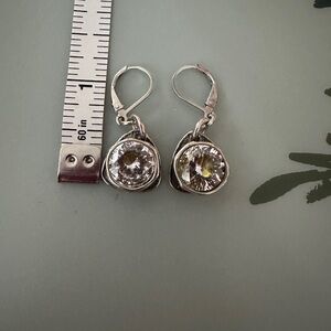 Karyn Chopik drop earrings.